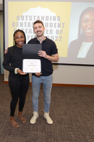 Chici Adeleke receiving the 2022 Outstanding Student Researcher Award