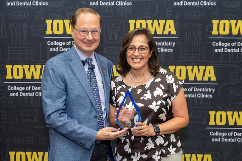 Dean Stanford and Marcela Hernandez posing for a photo after Hernandez received the 2025 McLeran Faculty Award