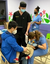 A dental screening at the Give Kids a Smile Event