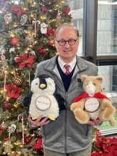 Clark Stanford with Percy Penguin and Cocoa the Cat