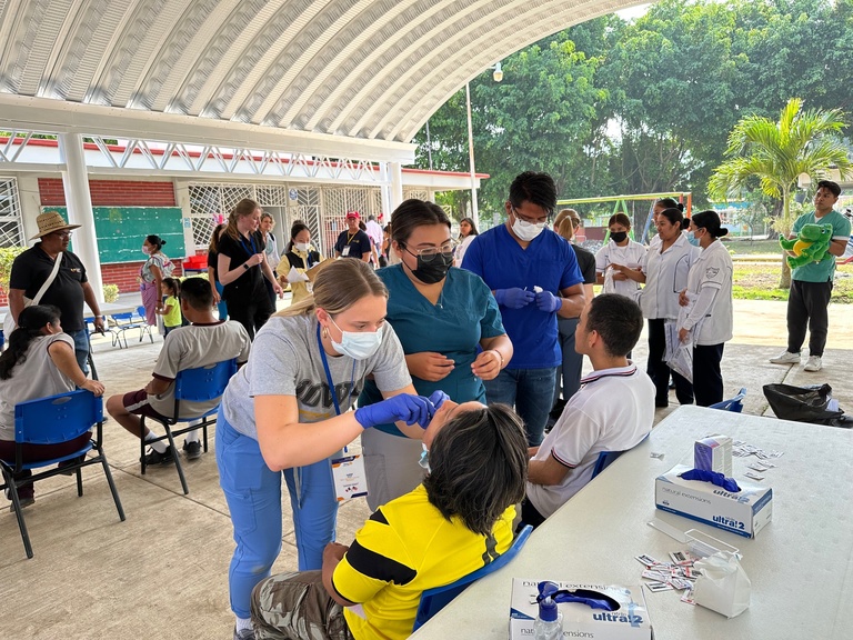 Isabel Wolf providing dental care in Mexico
