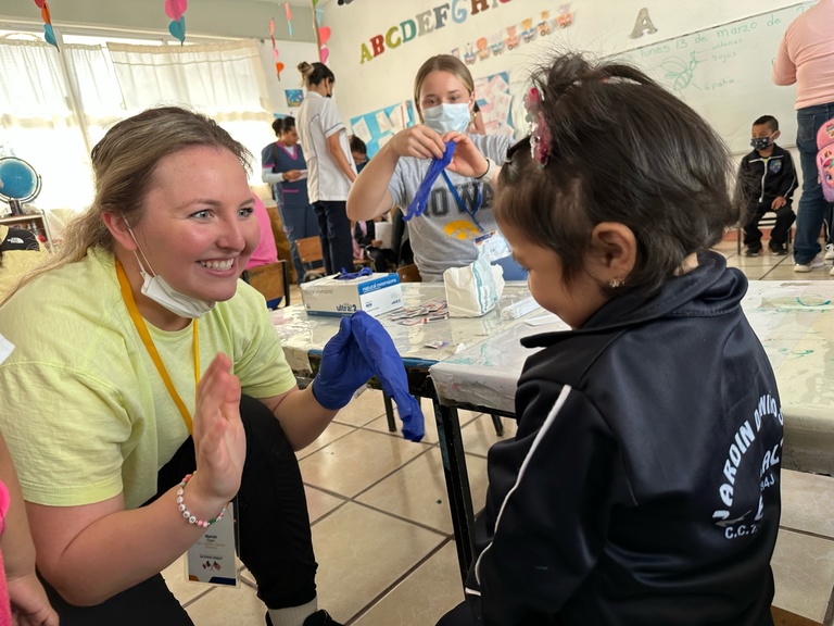 Mariah Oyen providing dental care in Mexico