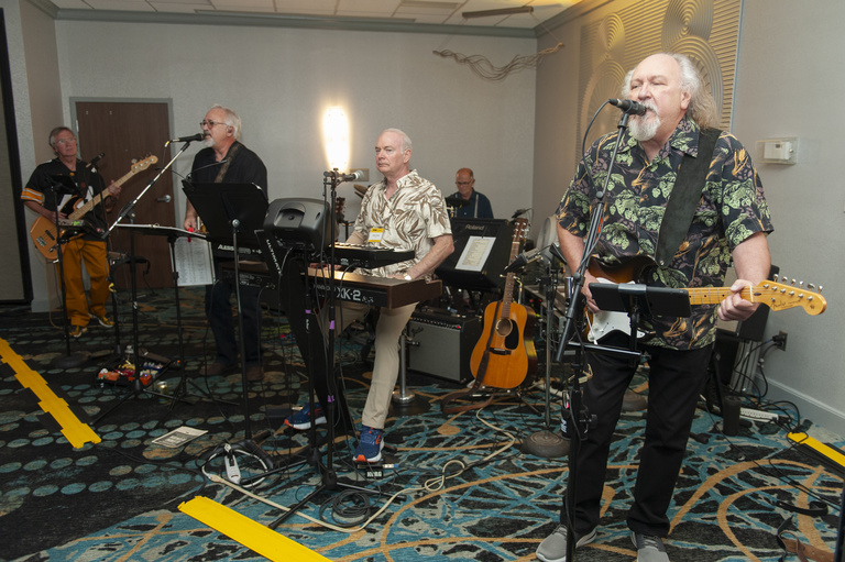 The Dogfathers Band, consisting of dental alumni, perform at the 2023 Alumni Reunion at the Radisson Hotel.