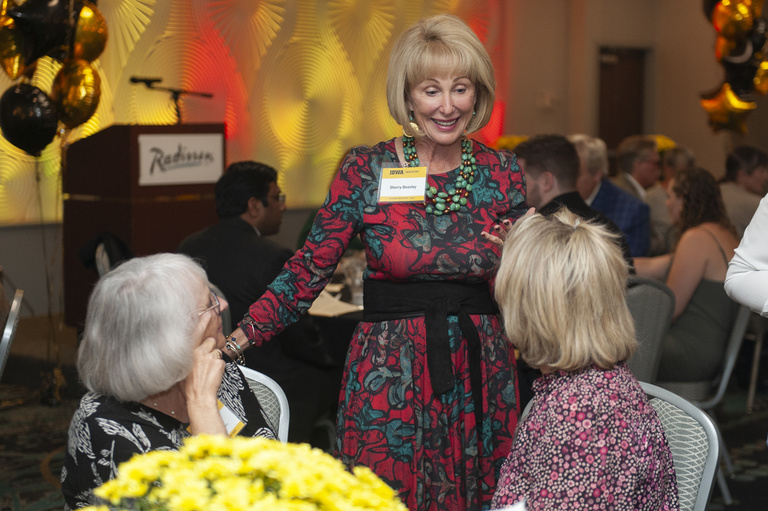Sherry Beasley talks with friends before the reception at the 2023 Alumni Reunion at the Radisson Hotel.