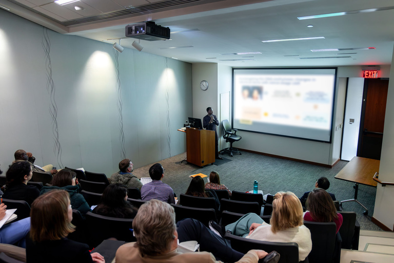 Faculty, staff, and students listen in during an oral presentation during the 2024 2024 AADOCR Research Day.