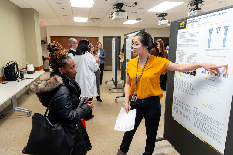 Poster presentations during the 2024 AADOCR Research Day.