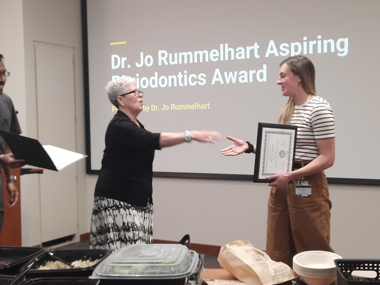 AAP Award presented by Dr. Rummelhart to McKenna Schnack