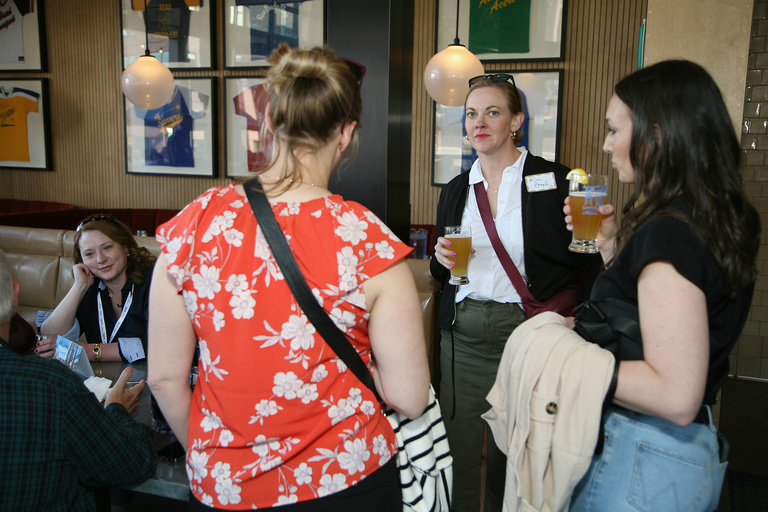 The UI College of Dentistry hosted an alumni reception at the Iowa Athletic Club Restaurant. These are pictures of attendees during the event.