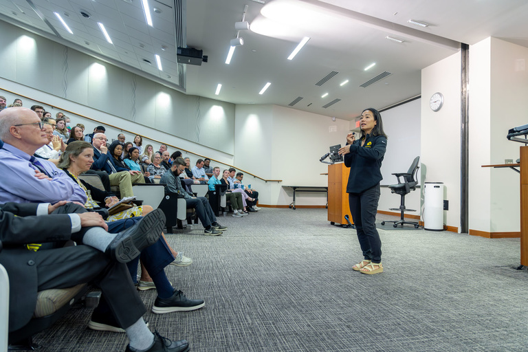 Coach Chun addresses the All-College Conference