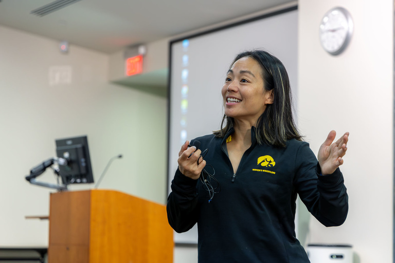 Coach Chun addresses the All-College Conference