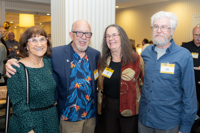 A group of alumni pose for a picture at the 2024 Alumni Reception.