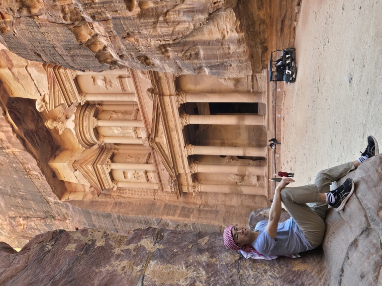 Kyungsup Shin poses in front of the ancient city of Petra.