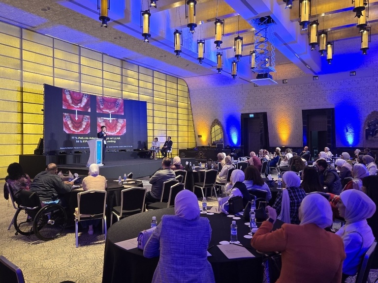 A wide-view of the room where Shin is conducting his keynote presentation.