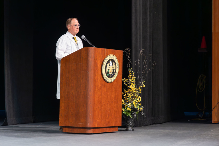 Picture of Dean Stanford speaking at White Coat Ceremony Fall 2024