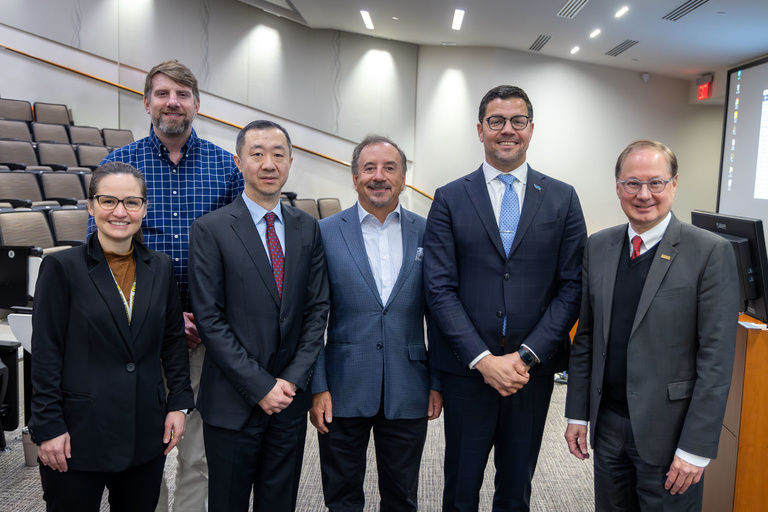 Following research day, a members of the college take a picture with keynote speaker Dr. Marcelo Araujo.