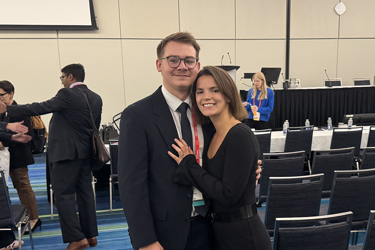 Bobera posing for a picture after receiving the award.