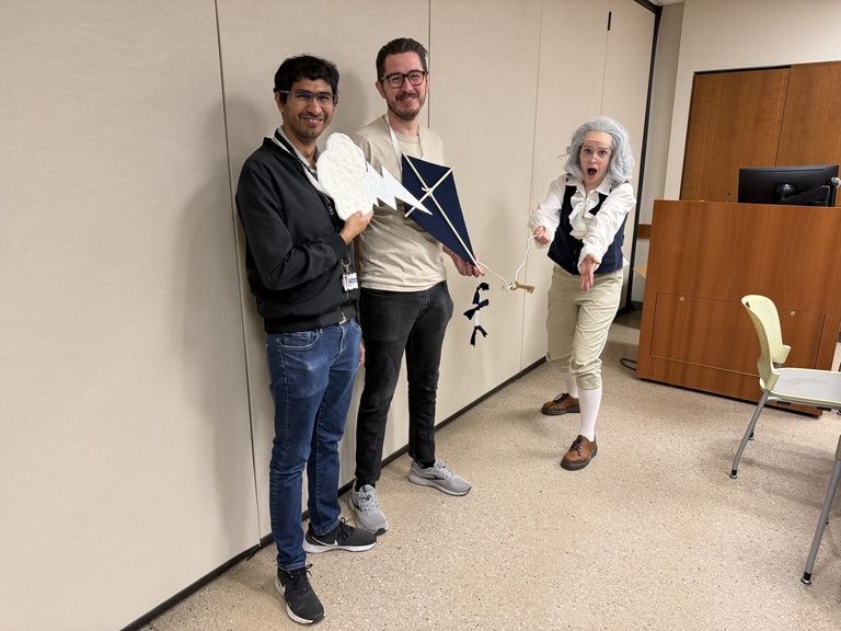Members of the CoD participate in a three-person Benjamin Franklin Halloween concept with a lightning bolt and kite.