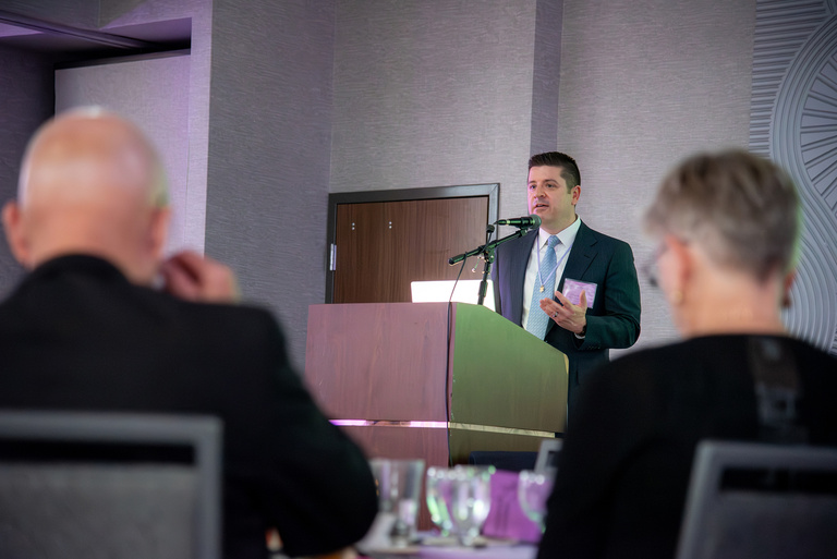 OKU President-Elect Dr. Chris Barwacz addresses the group during the OKU Reception.