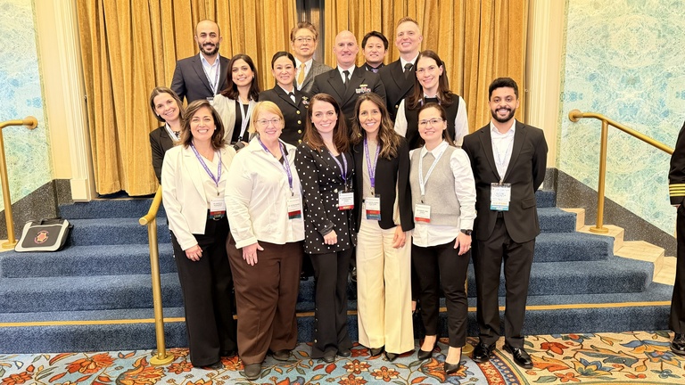 Faculty and alumni from the Operative Dentistry graduate program take a picture together at the AOD meeting.