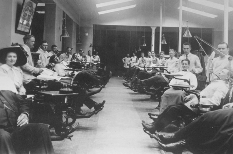 An old picture of dental students working in Old Dental