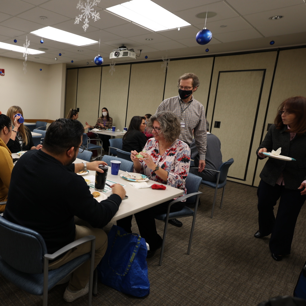 College of Dentistry faculty, staff, students, and residents attending the International Potluck