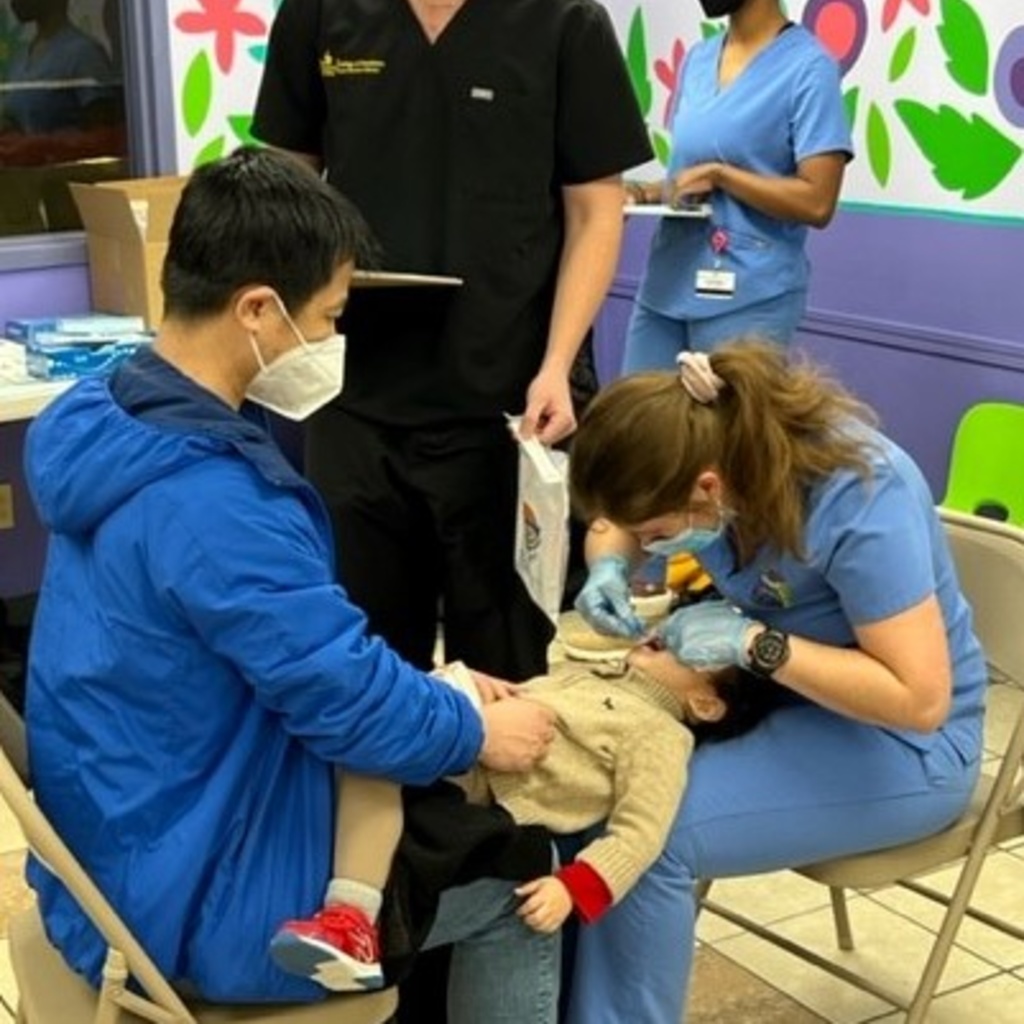 A dental screening at the Give Kids a Smile Event