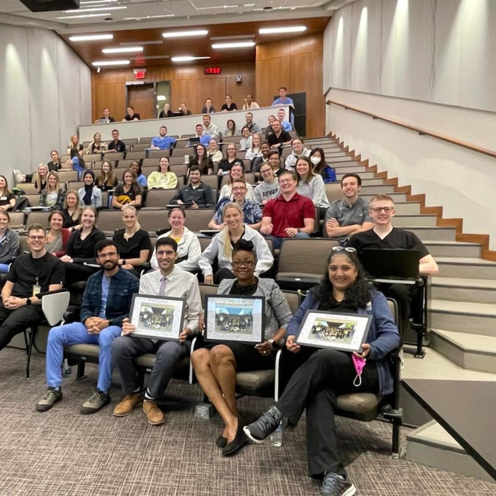 Second-year dental students with faculty and residents of the year