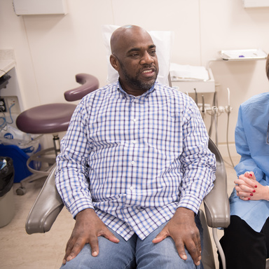 Patient Kenny Williams with Dental Student Madeline Stead