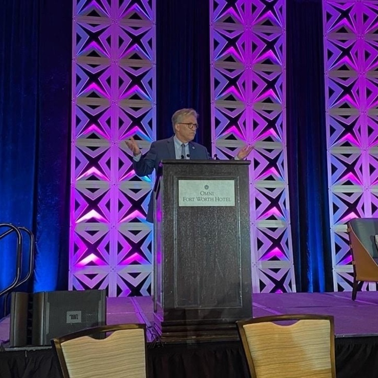 John Warren giving his address as president