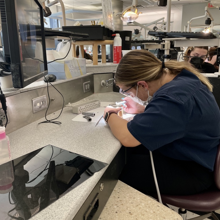 Student in the SIM clinic at the 2022 IASDA Summer Academy