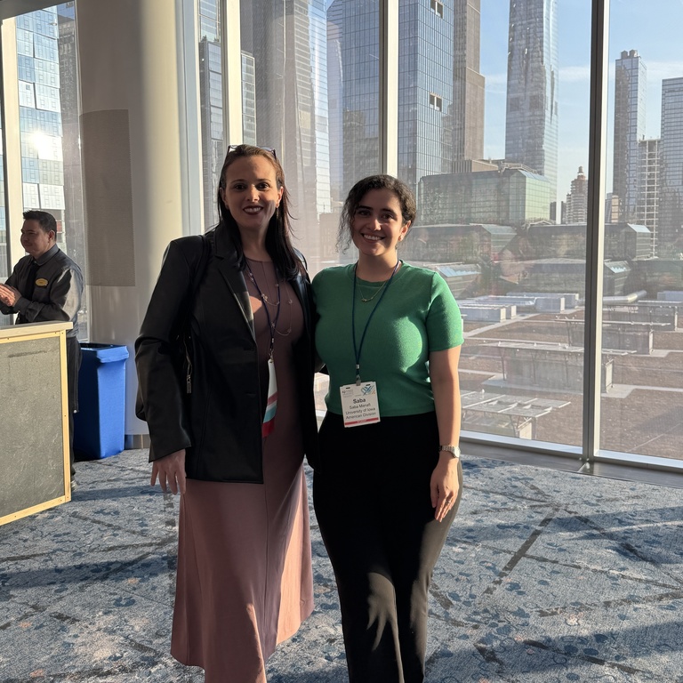 Saba Manafi and Aline Petrin pose for a photo.