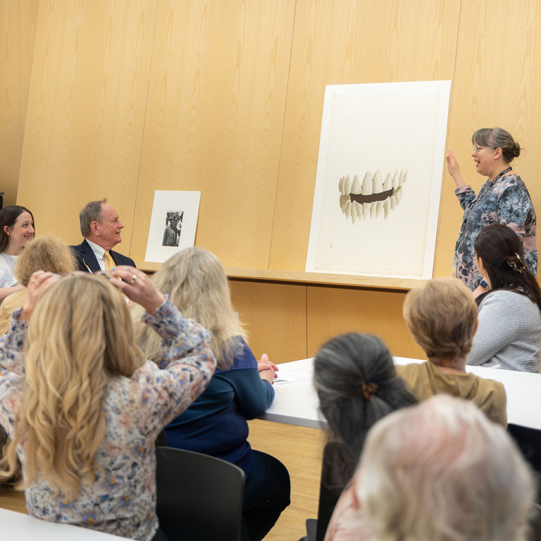 Stanley Museum of Art staff sharing information about a piece of art