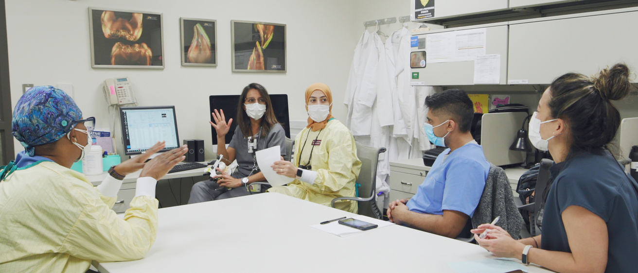 A group of dentists learning a dental technique